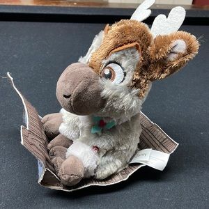 Sven from Frozen. Push the button on his leg and it plays music and rolls.